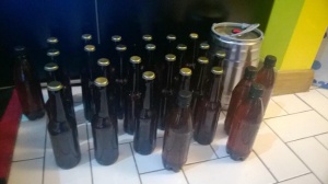 homebrew beer bottles and keg